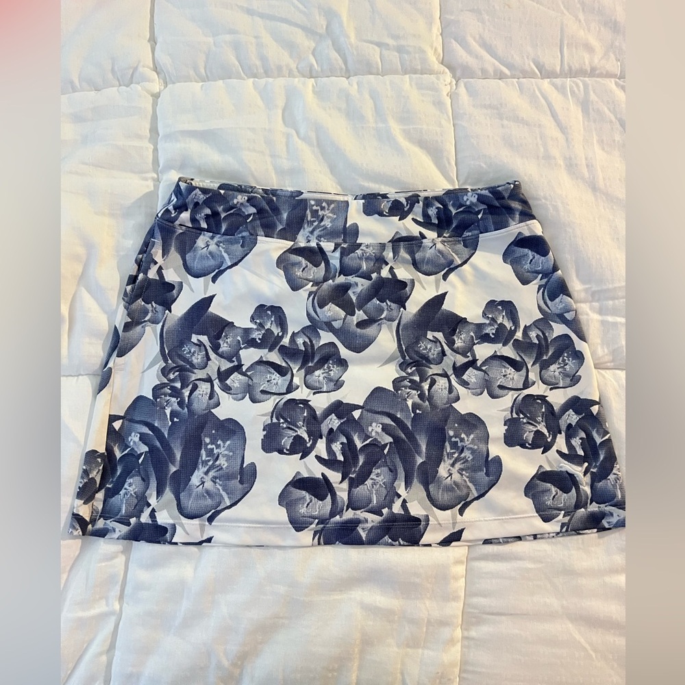 Puma Blue Floral Mini Skort with Side Pockets and a Back Pocket
